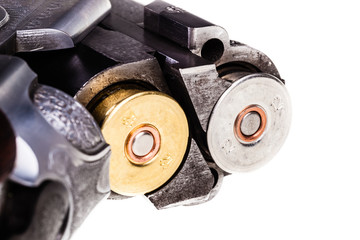 Loaded shotgun on white