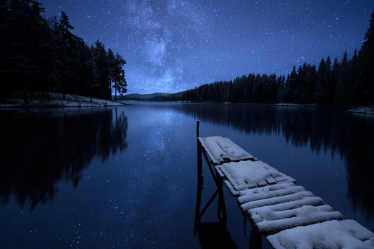 Fototapeta Jetty and lake at night