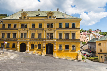 Fototapeta na wymiar Yellow building on the square in Banska Stiavnica, Slovakia