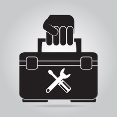 Hand holding with toolbox icon