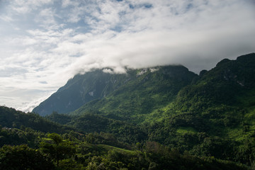 Obraz premium The big mountain with rain fog