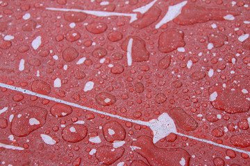 Rain drops and condensation on the stretch film of a paving stone blocks batch