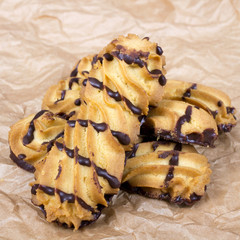 cookies with chocolate on baking paper