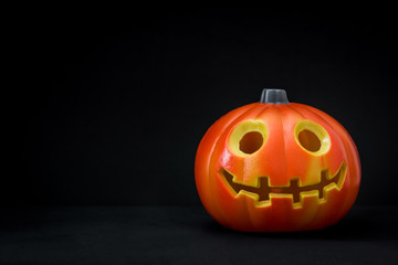 Halloween pumpkin on black background

