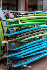 Surf boards in a stack