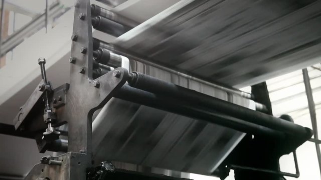 Footage of a high speed printing press