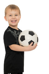 Little boy with soccer ball