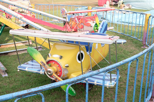 Carousel / Empty airplane carousel in amusement park.