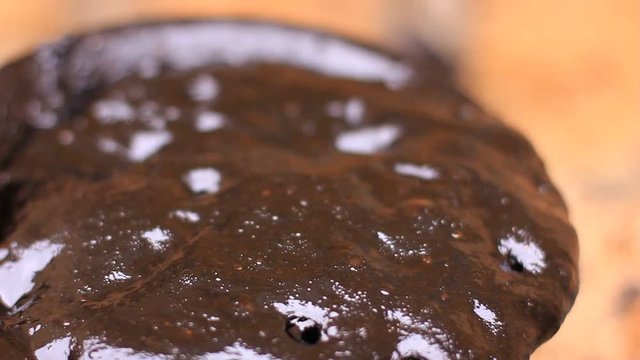 boiling and bubbling tar