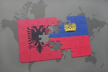 puzzle with the national flag of albania and liechtenstein on a world map background.