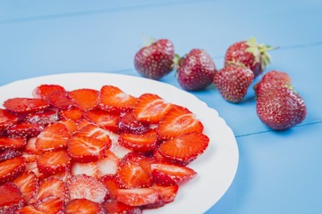 plate with sliced strawberries