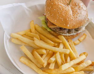 Hamburger with Lettuce, French fries and Cheese