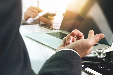 Medical technology network team meeting concept. Doctor hand wor