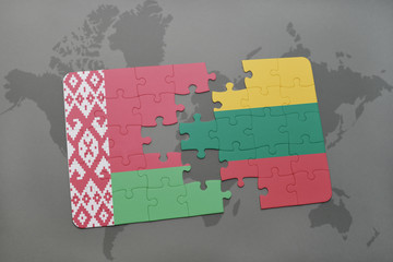 puzzle with the national flag of belarus and lithuania on a world map background.