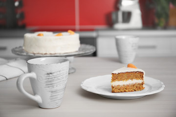 Tasty slice of carrot cake on white plate