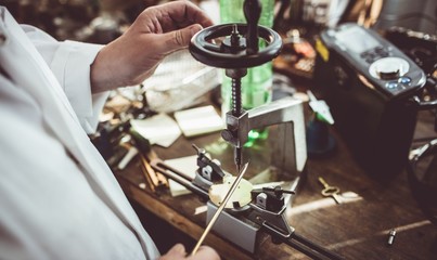 Mid section of horologist using a horological milling machine
