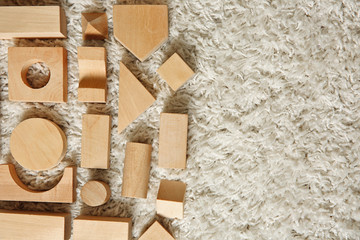 Set of wooden kids building blocks, top view