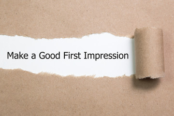 Make a Good First Impression message written under torn paper.