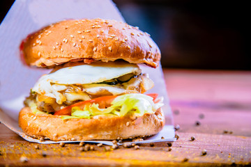 Burger with egg and cheese cutlet