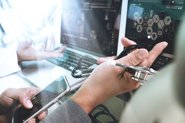 Medical technology network team meeting concept. Doctor hand wor