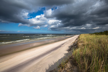 Fototapeta na wymiar A view of beautiful sandy beach in Leba town, Baltic Sea, Poland