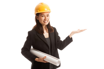 Asian engineer woman with blueprints show her palm hand.
