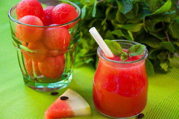 watermelon smoothie decorated with mint. Watermelon balls
