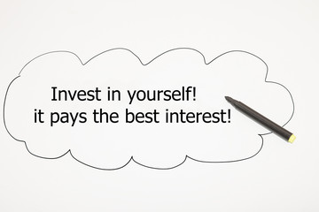 Hand writing Invest in yourself, it pays the best interest with marker in a painted bubble 