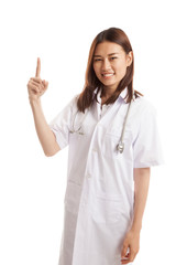 Asian young female doctor point up.