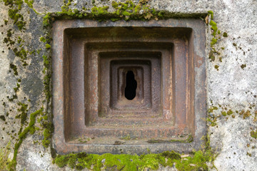 Old bunker from World War II - detail of loophole