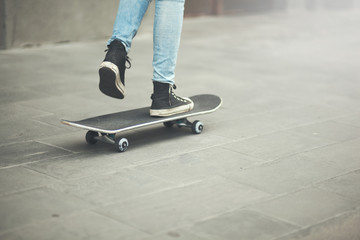 legs on skateboard