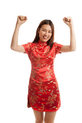 Happy Asian girl in chinese cheongsam dress.