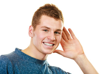 gossip boy with hand behind ear spying