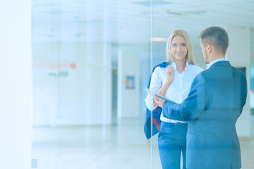 Fototapeta premium Businesspeople walking in the corridor of an business center