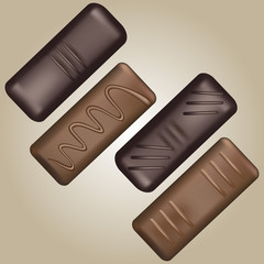 Chocolate pralines on brown background