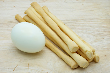 Grissini and boiled egg