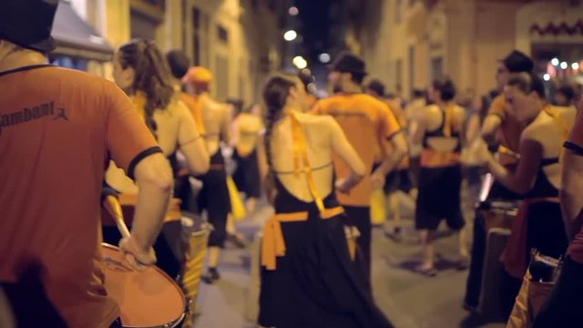 brazilian style drumers play during a street festival