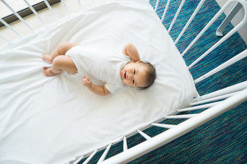 the top view of baby in cot, cradle © alice_photo