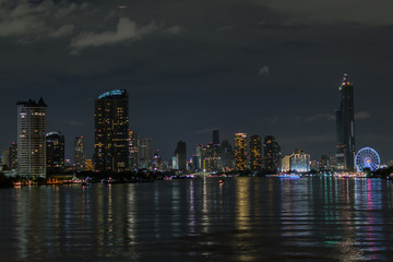 Fototapeta na wymiar City Landscape At Night. Asiatique Riverfront Bangkok,Thailand.