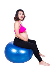 Pregnant woman with fitness ball on white background