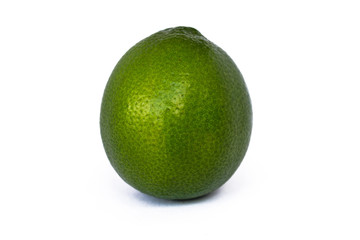 Lime with leaf on a white background.