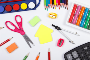 School accessories and shape of building on white background, back to school concept
