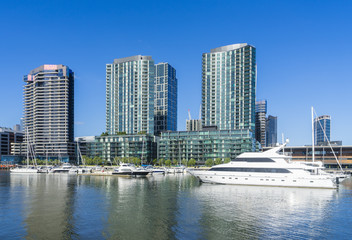 Fototapeta na wymiar Modern waterfront apartments and marina in Melbourne, Australia