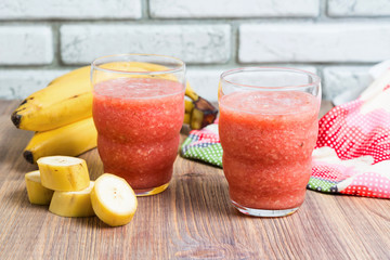 Fresh watermelon juice in the glass. Selective focus on the front glass