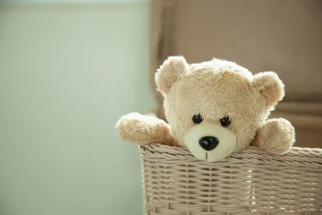 Fotobehang toy teddy bear in basket © suthisak