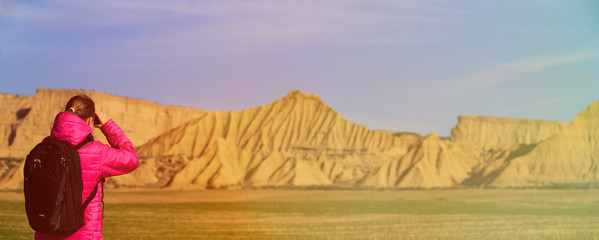 young woman travel in mountains, wide panorama