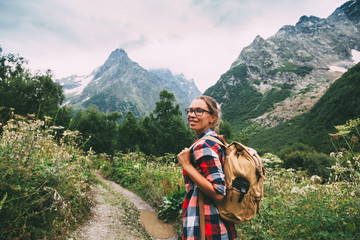 Hiker walking to mountains