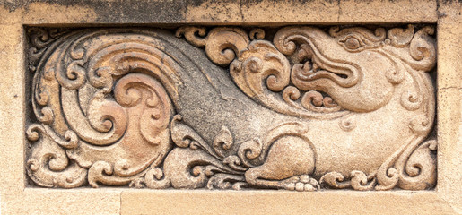 A carving of a Makara, a mythical creature, at the Kelaniya temple, Sri Lanka.