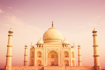 The Taj Mahal of India  with a warm color tone.