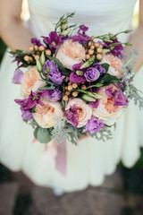 Bride holding wedding bouquet
